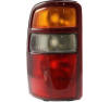 suburban rear tail light lens assembly with housing