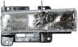 GMC Yukon headlight lens cover and housing assembly