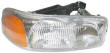 GMC Yukon headlight lens cover and housing assembly
