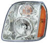 GMC Yukon headlight lens cover and housing assembly