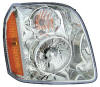 GMC Yukon headlight lens cover and housing assembly